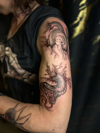 EllioS tattoo